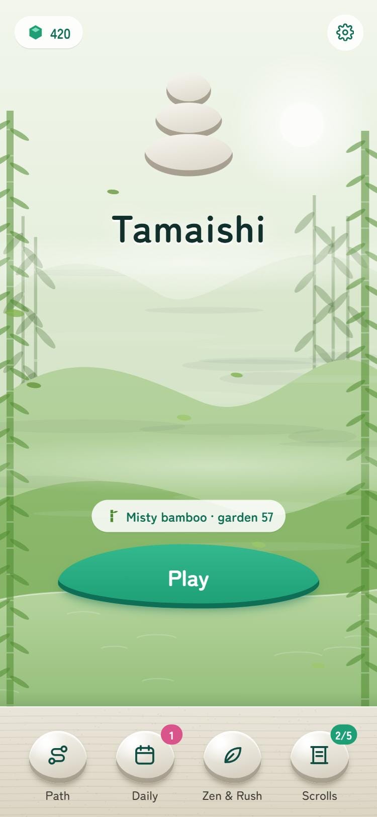 The Tamaishi home screen: a stone cairn over a misty pond with a Play button